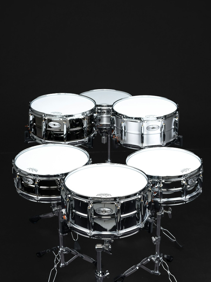 A group of drums sitting on top of each other